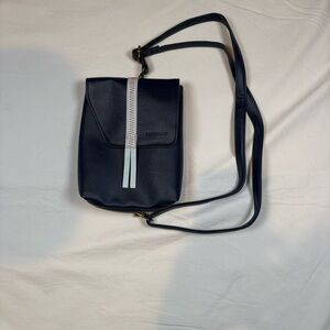 Raven + Lily Black Crossbody Backpack with White Trim
